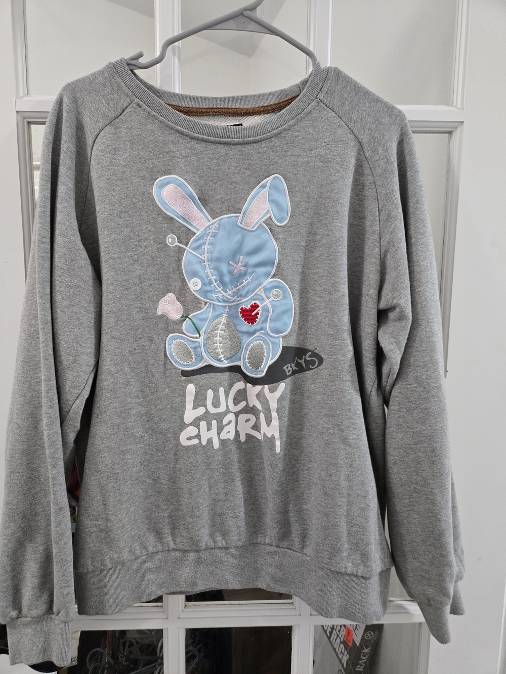 Lucky Charm Grey Womens Sweatshirt with Blue Bunny Graphic